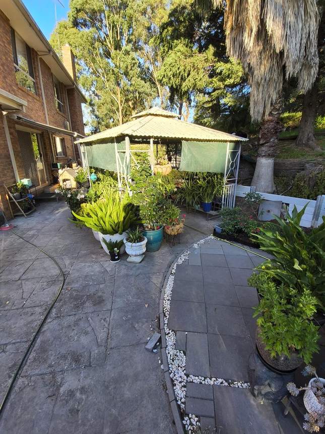Templestowe backyard before outdoor transformation — bare concrete yard